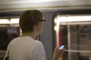 20170110 sf transit user with smartphone